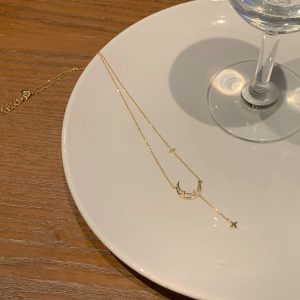 Mother of pearl necklace star moon choker - gold plated celestial design